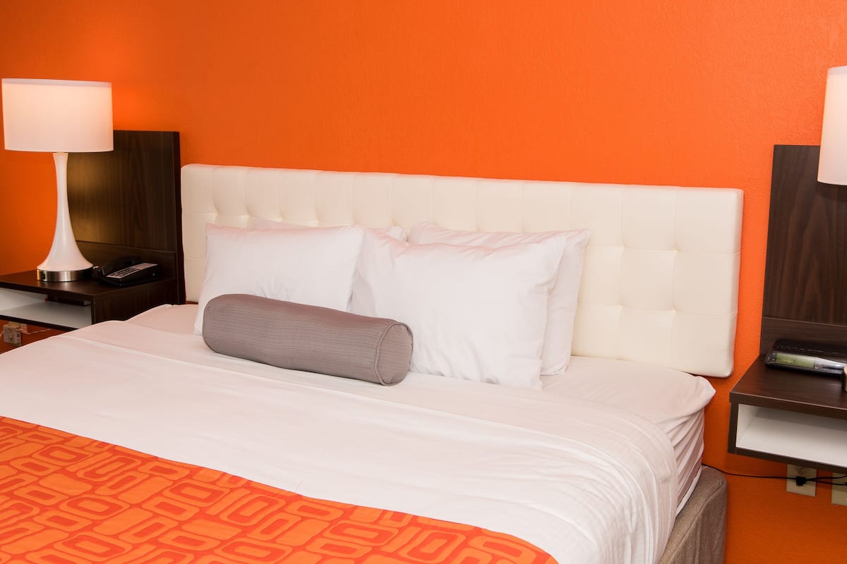 room, 1 king bed, non smoking | desk, laptop workspace, blackout curtains, iron/ironing board