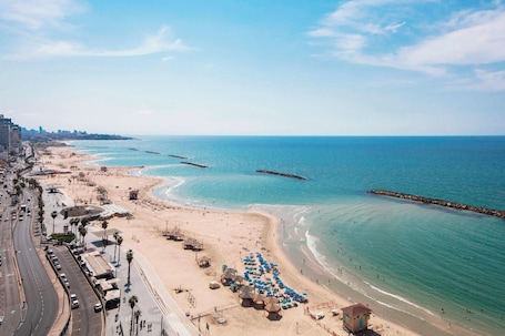 Premium bedding, down comforters, pillowtop beds, minibar