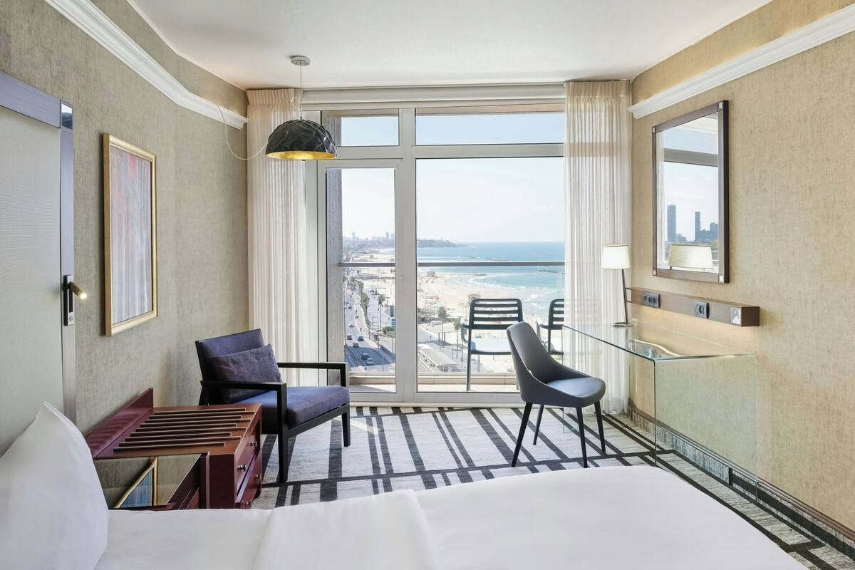 Premium bedding, down comforters, pillowtop beds, minibar