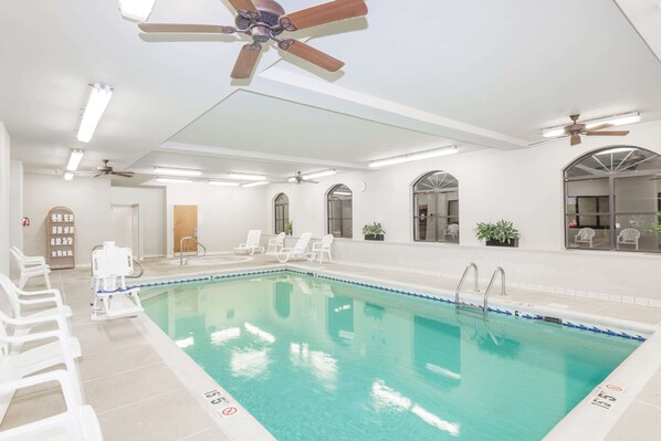 Indoor pool, open 7:00 AM to 10:00 PM, pool loungers