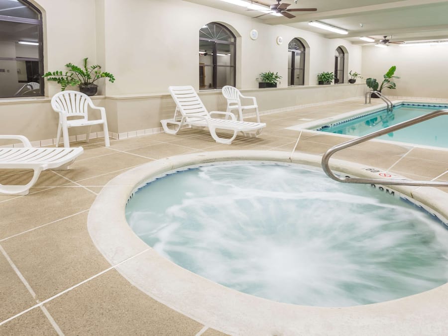 Indoor pool, open 7:00 AM to 10:00 PM, pool loungers