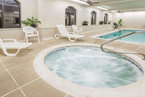 Indoor pool, open 7:00 AM to 10:00 PM, pool loungers