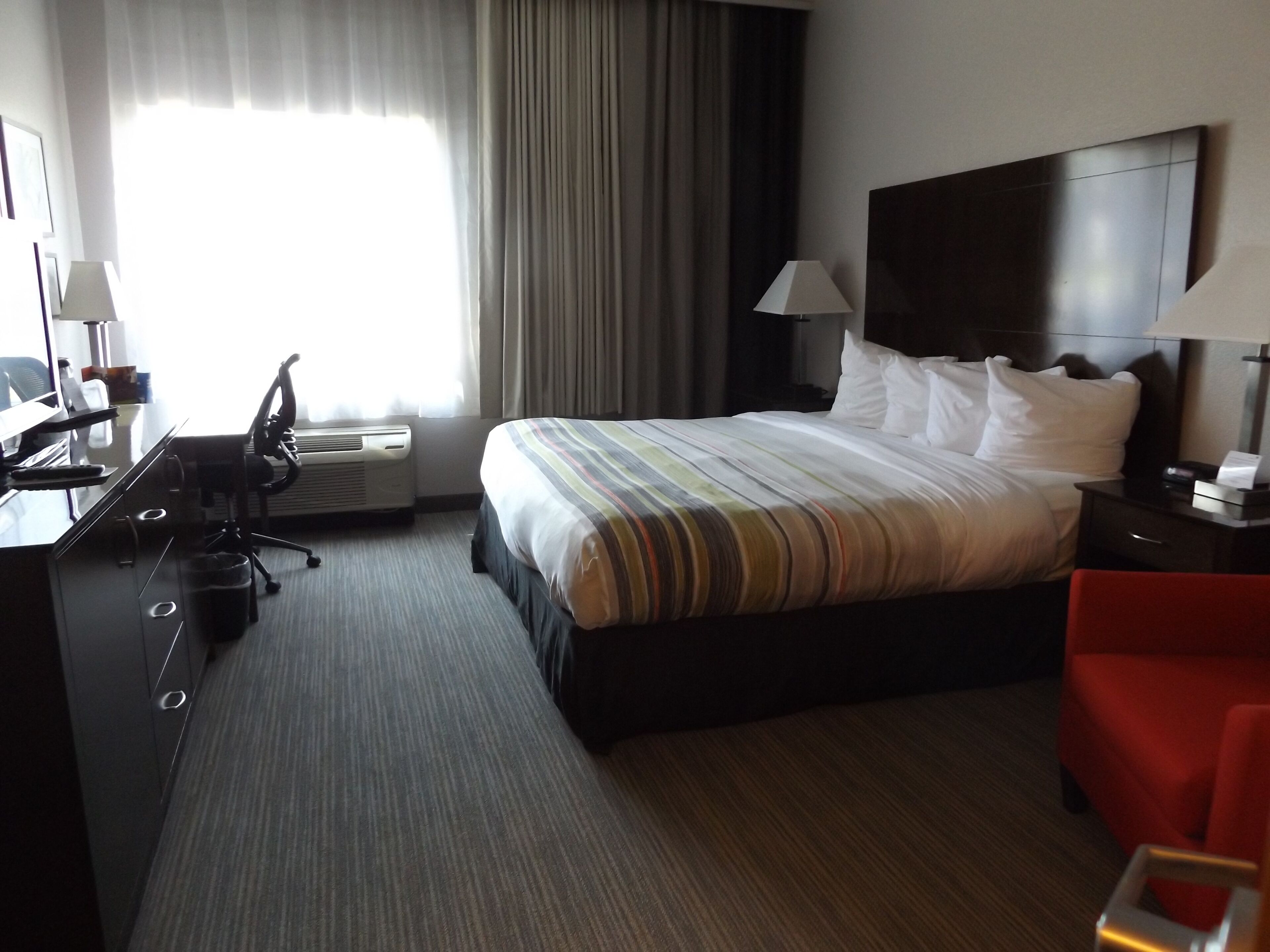 room, 1 king bed, accessible, non smoking (roll-in shower) | 1 bedroom, in-room safe, desk, blackout curtains