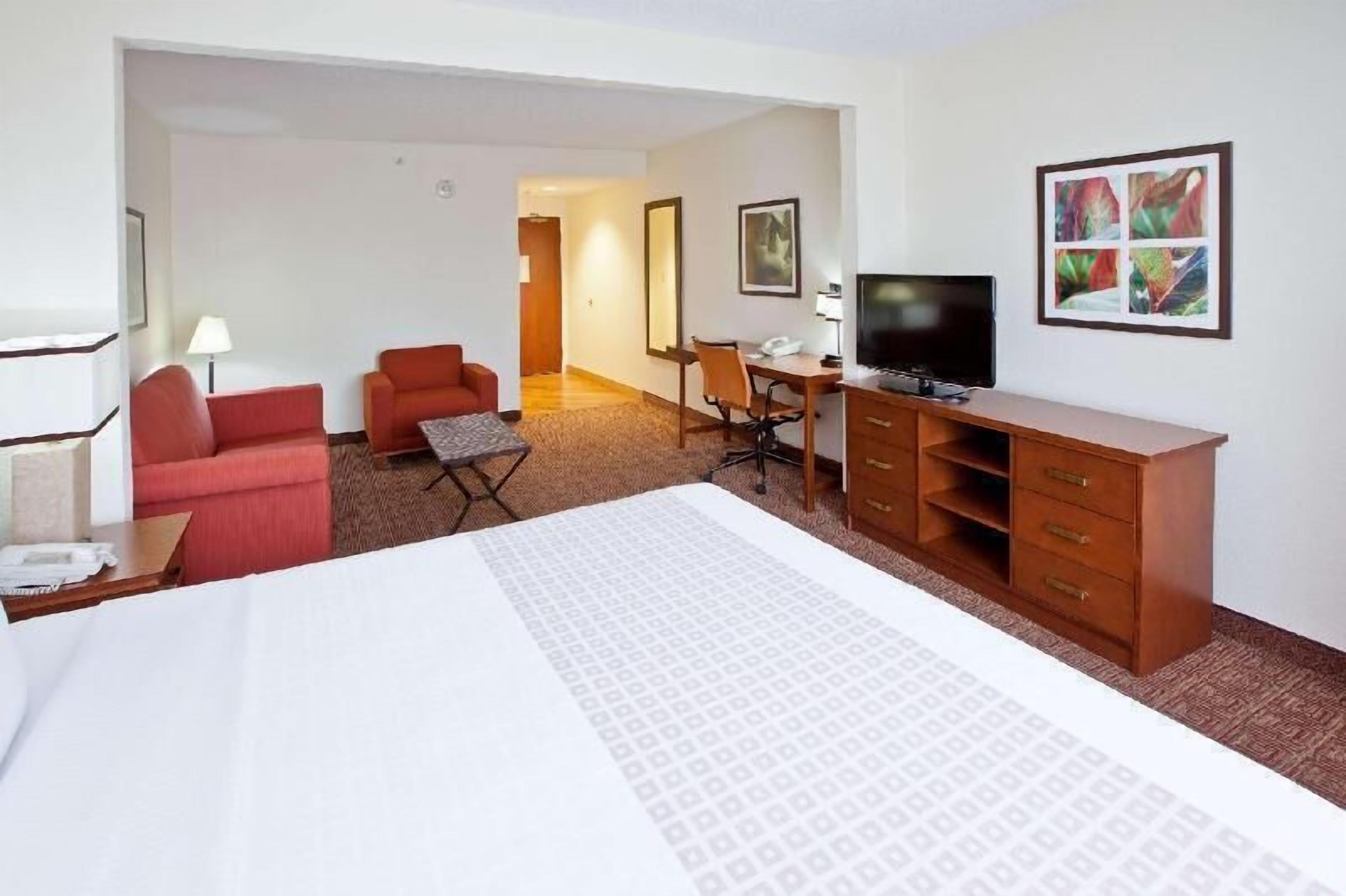 Premium bedding, pillowtop beds, desk, laptop workspace