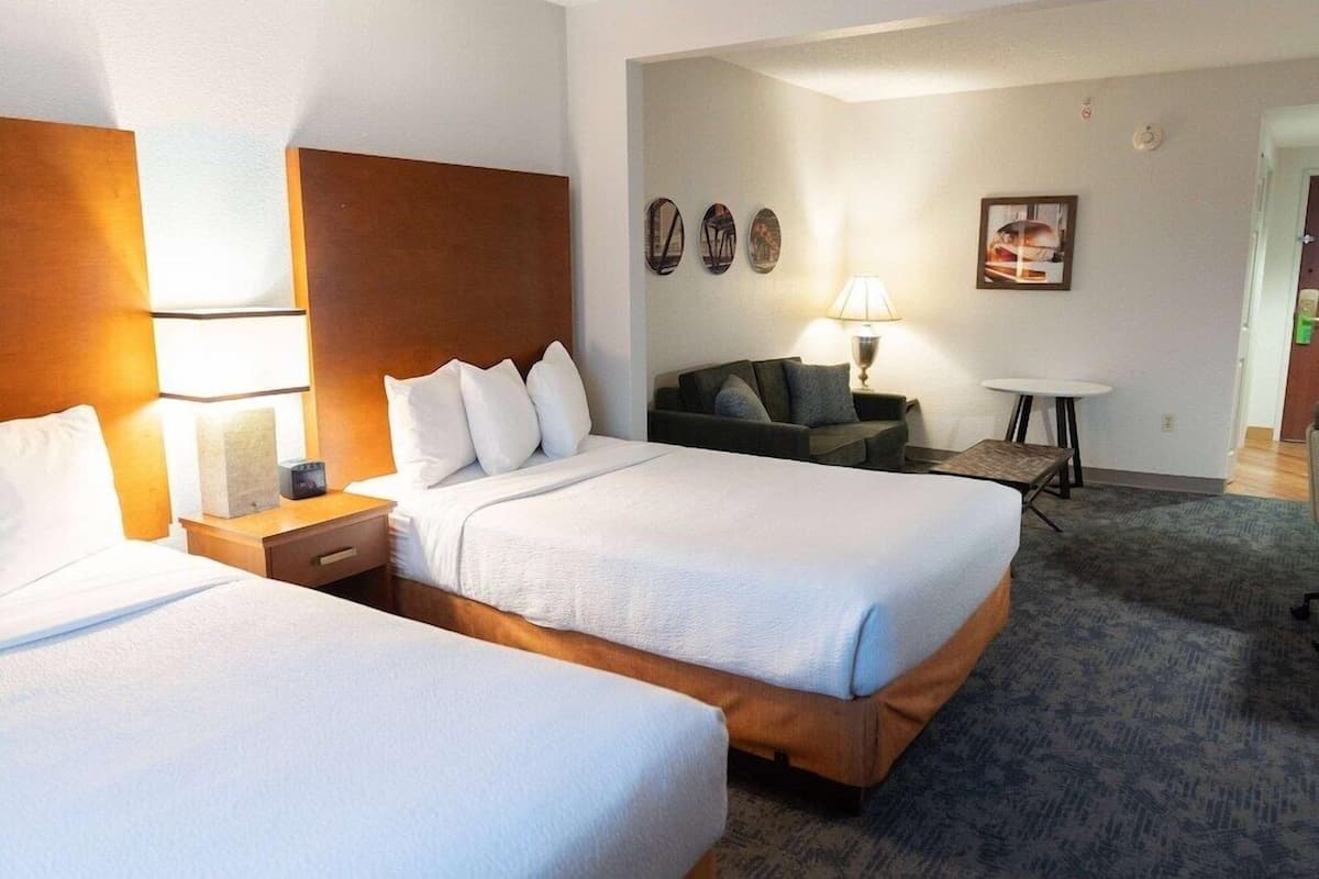 Premium bedding, pillowtop beds, desk, laptop workspace