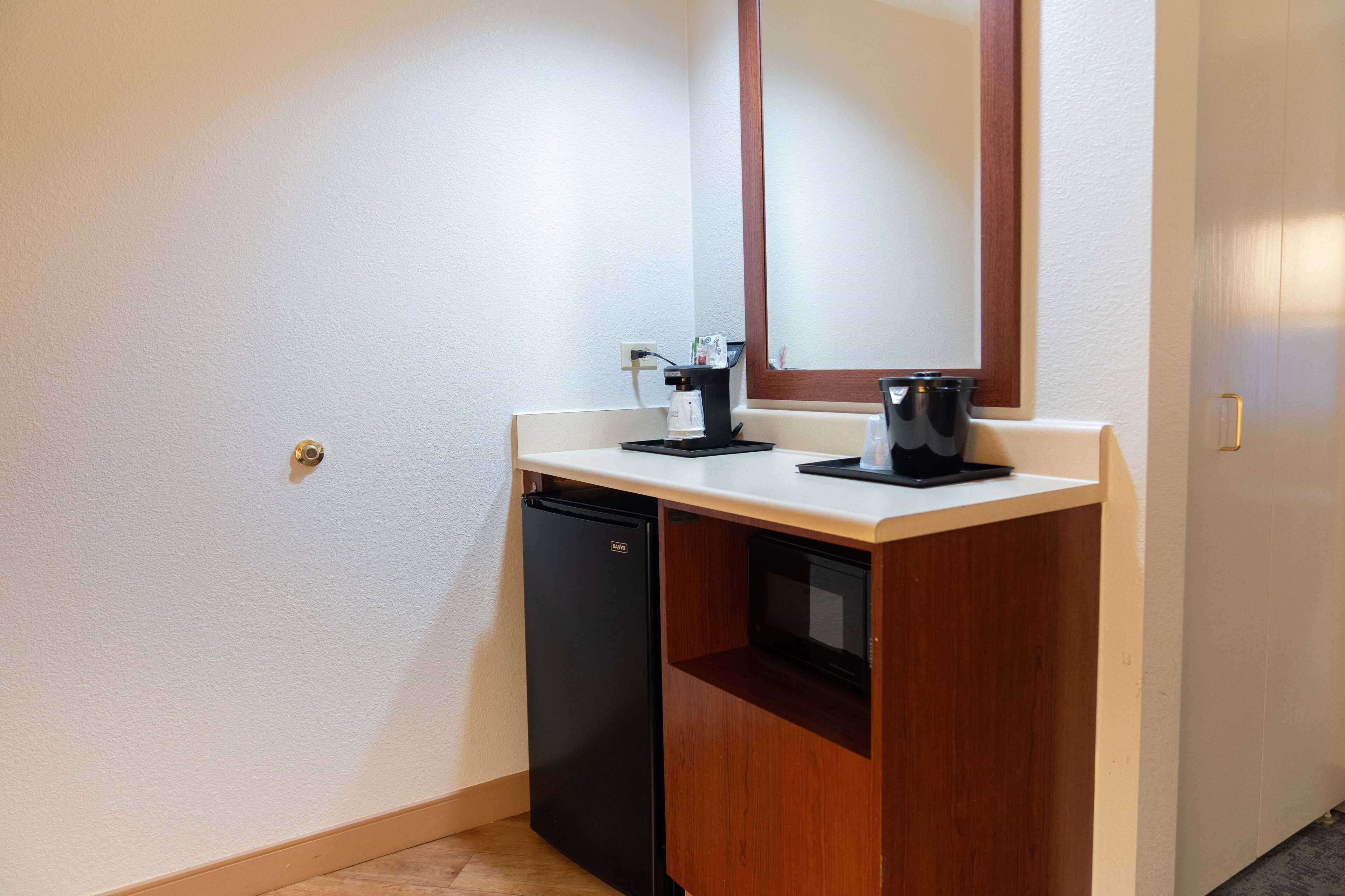 premium bedding, pillow-top beds, desk, laptop workspace