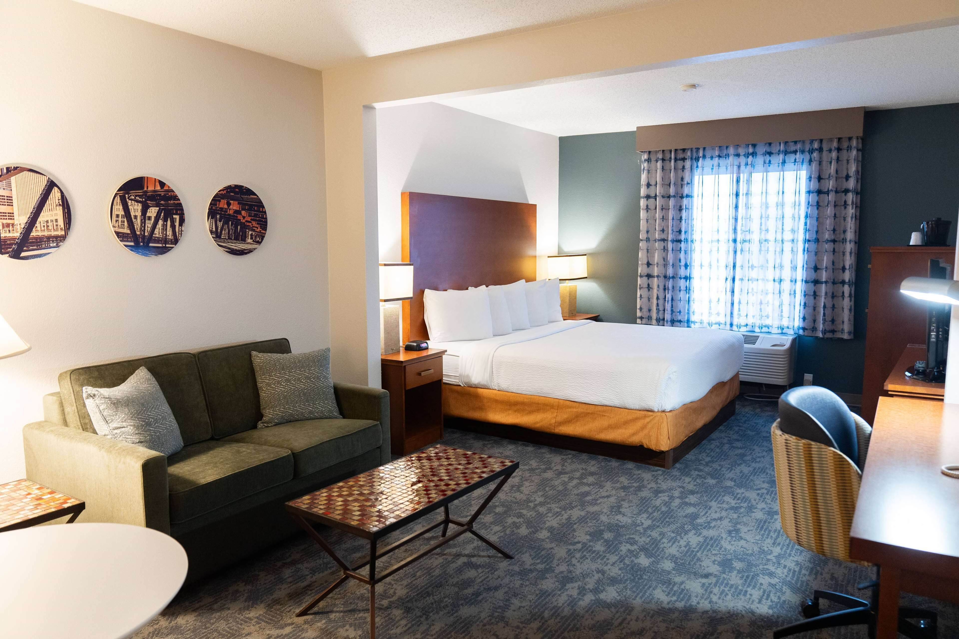 premium bedding, pillow-top beds, desk, laptop workspace