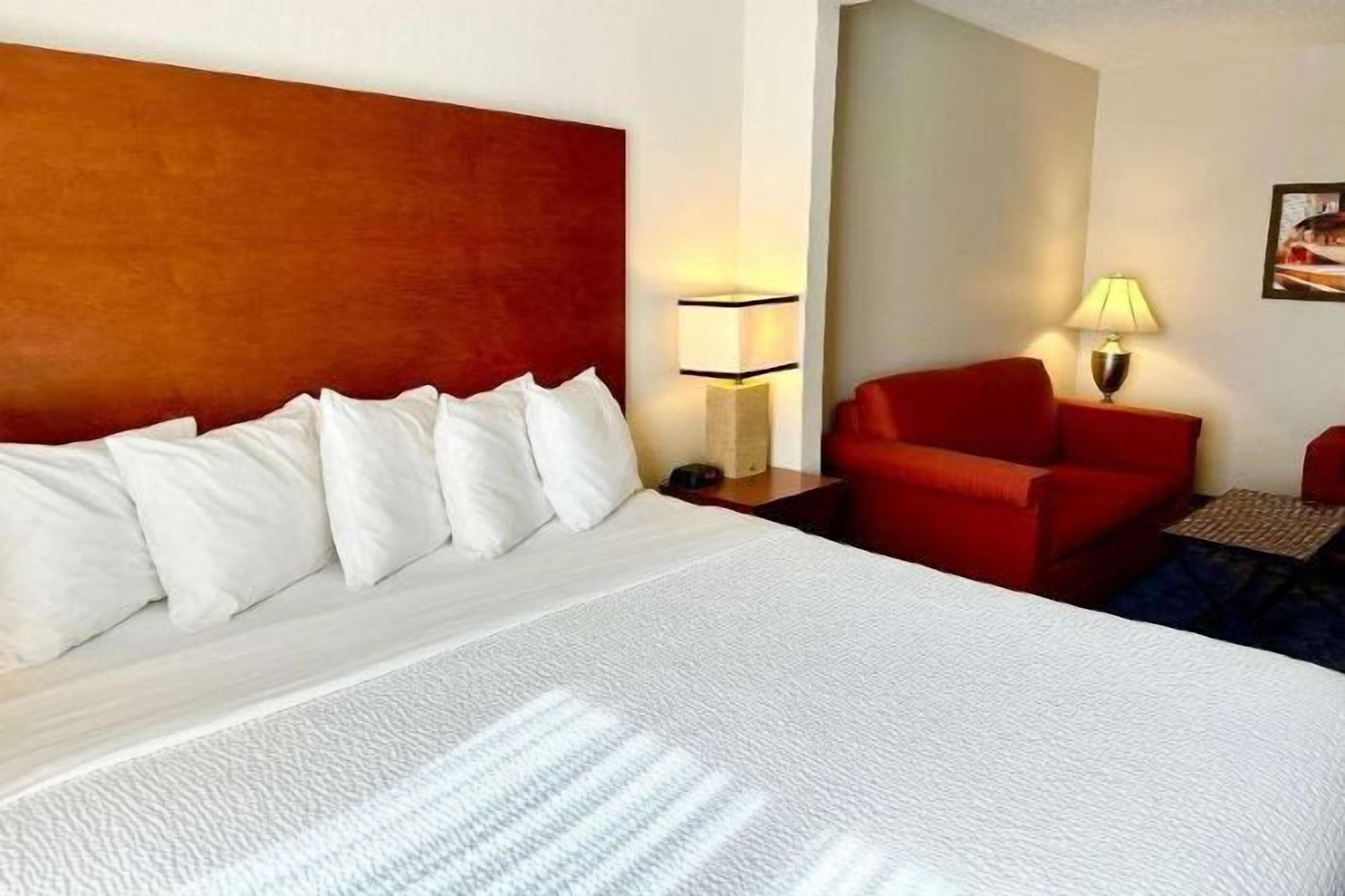 Premium bedding, pillowtop beds, desk, laptop workspace