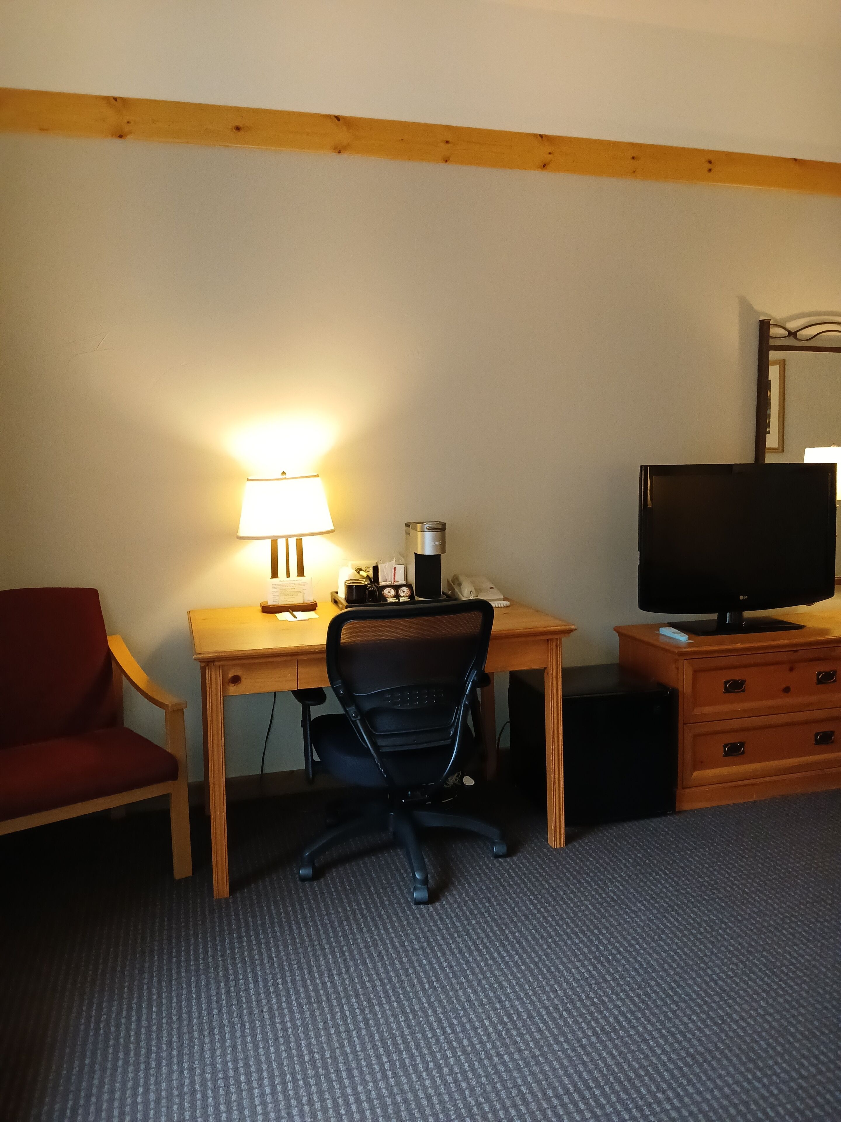 parking lot single queen ada | 1 bedroom, individually decorated, individually furnished, desk