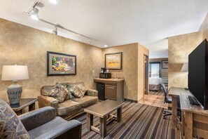 Suite, 1 King Bed with Sofa bed, Non Smoking, Balcony (with Sofabed) | Desk, laptop workspace, blackout drapes, iron/ironing board