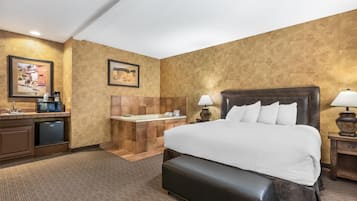 Junior Suite, 1 King Bed, Non Smoking, Jetted Tub | Desk, laptop workspace, blackout curtains, iron/ironing board