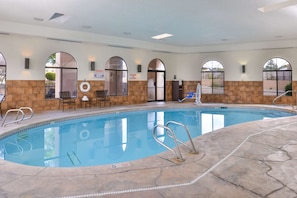 Indoor pool, open 8:00 AM to 11:00 PM, pool loungers