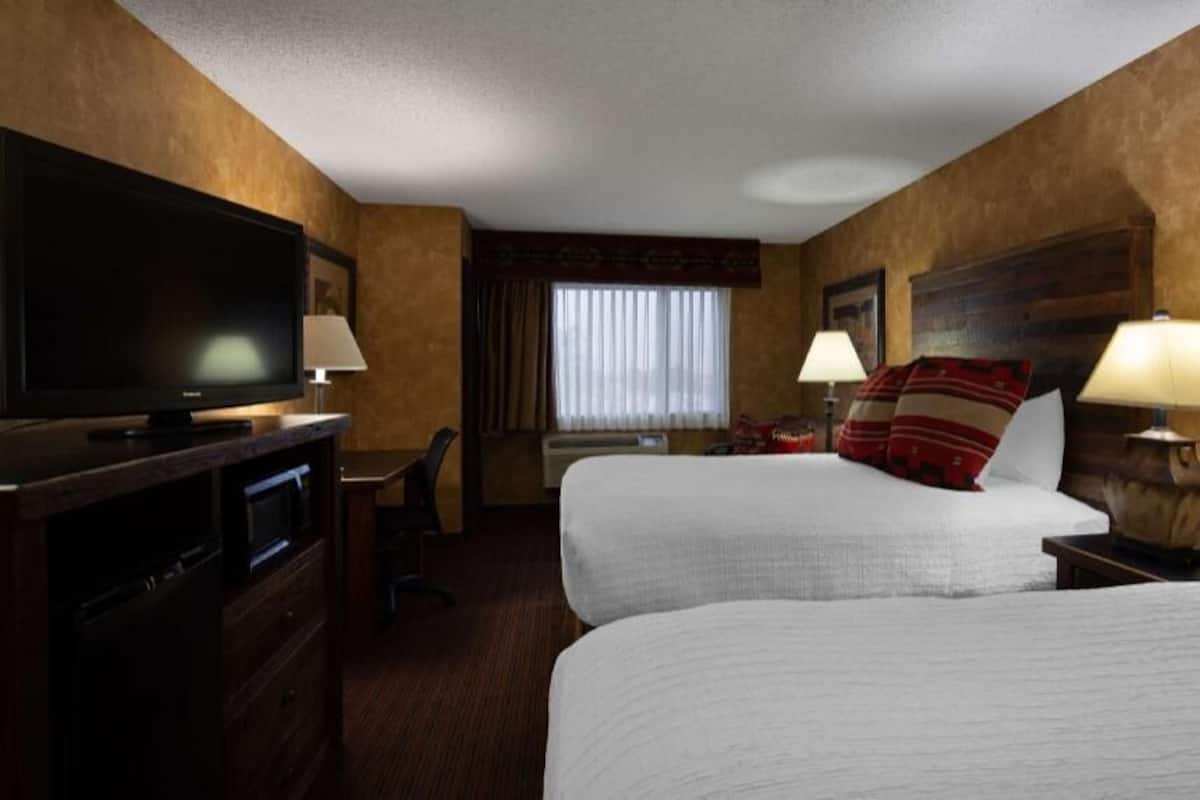 Desk, laptop workspace, blackout drapes, iron/ironing board