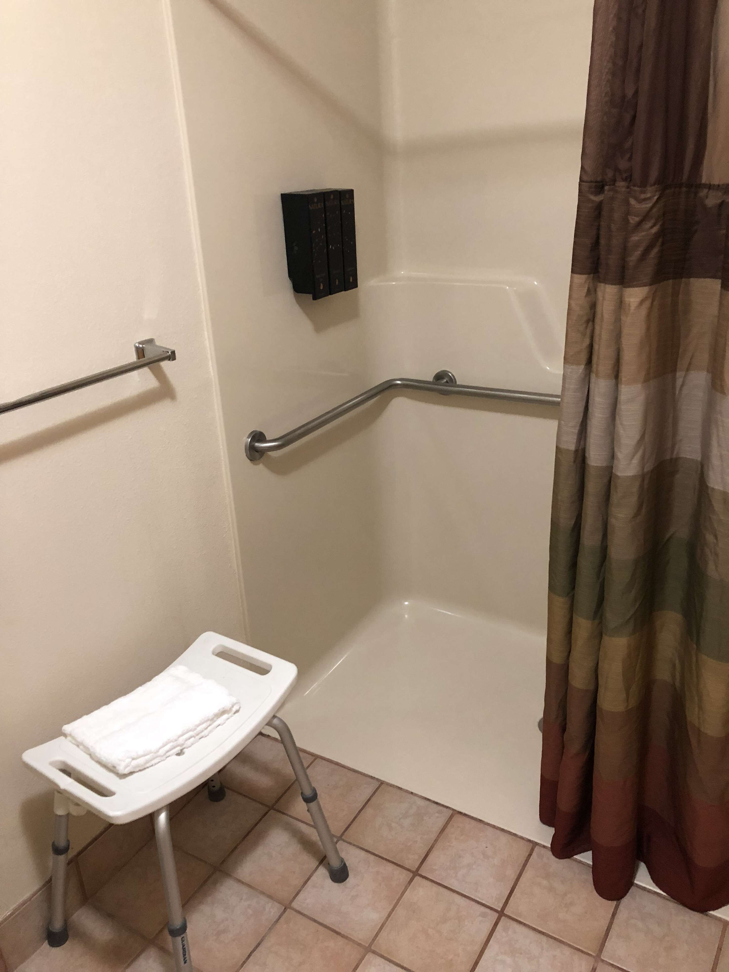combined shower/bathtub, free toiletries, hair dryer, towels
