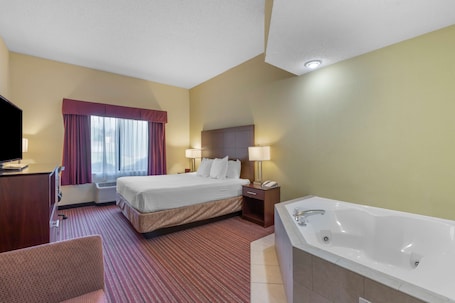 标准房, 1 张特大床, 无烟房, 按摩浴缸 | 办公桌、笔记本电脑工作区、遮光窗帘、熨斗/熨衣板