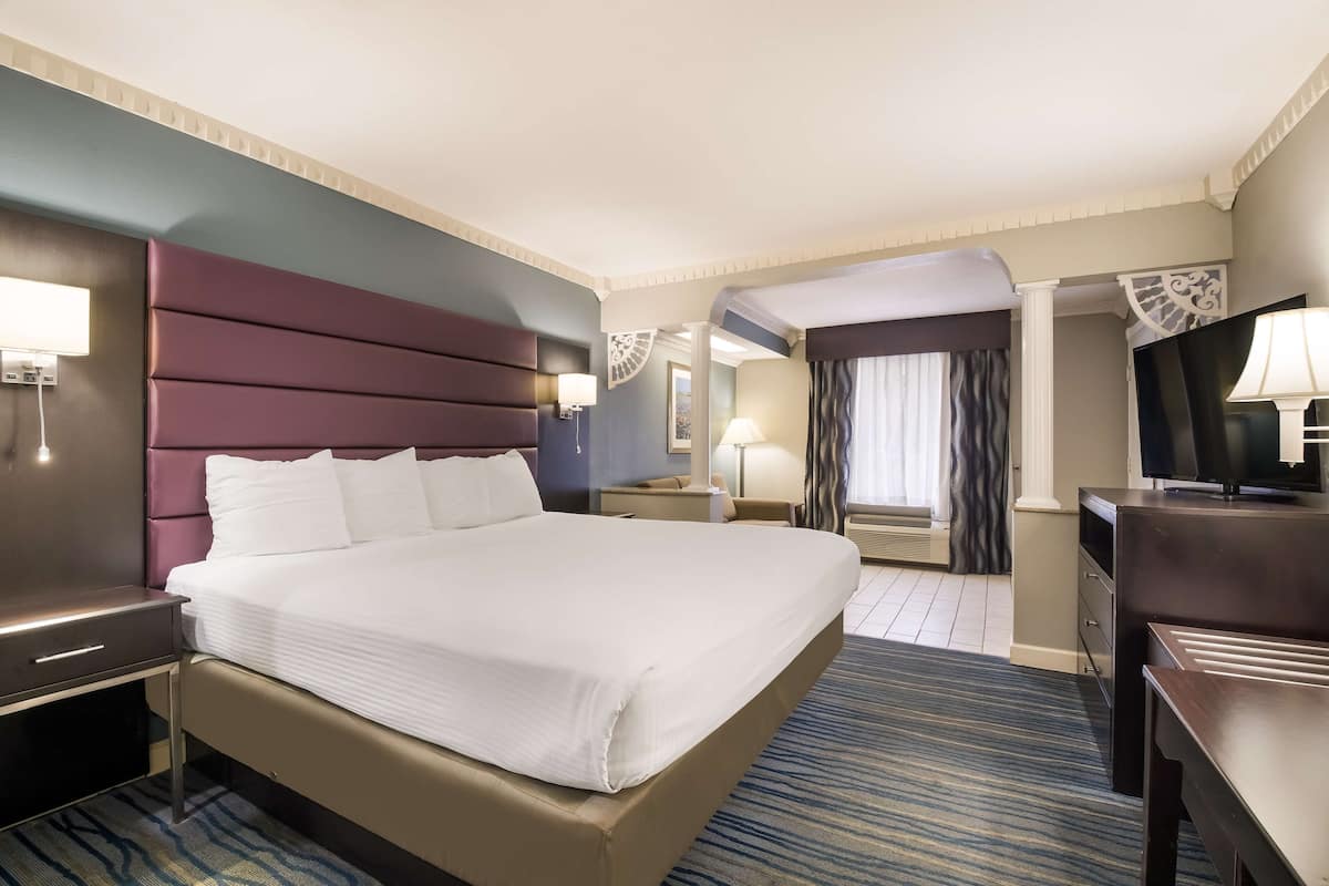 Suite, 1 King Bed, Jetted Tub (Oversized Room) | 1 bedroom, desk, laptop workspace, blackout drapes