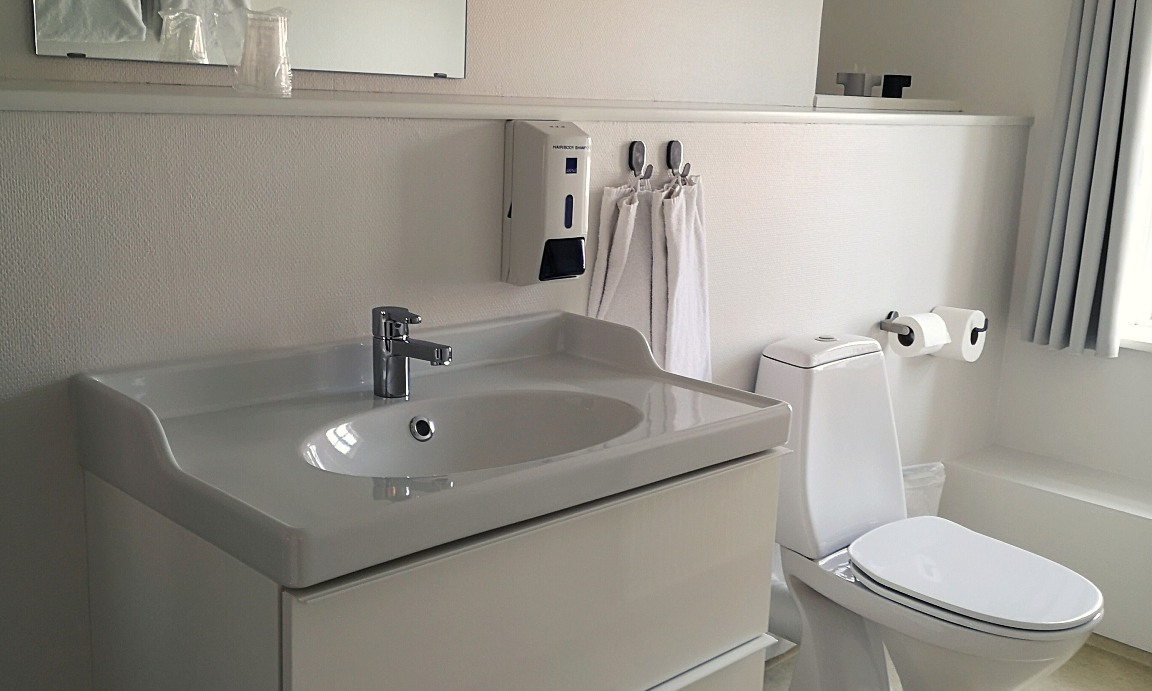 standard room | bathroom | shower, hair dryer, towels, soap