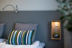 Desk, iron/ironing board, cribs/infant beds, rollaway beds