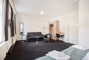 Family Quadruple Room, 1 Bedroom | Desk, blackout drapes, iron/ironing board, free WiFi