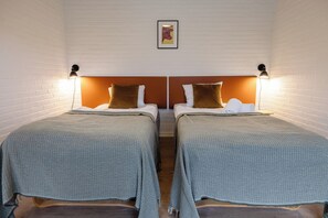 Quarto econômico | Roupas de cama antialérgicas, escrivaninha, Wi-Fi de cortesia