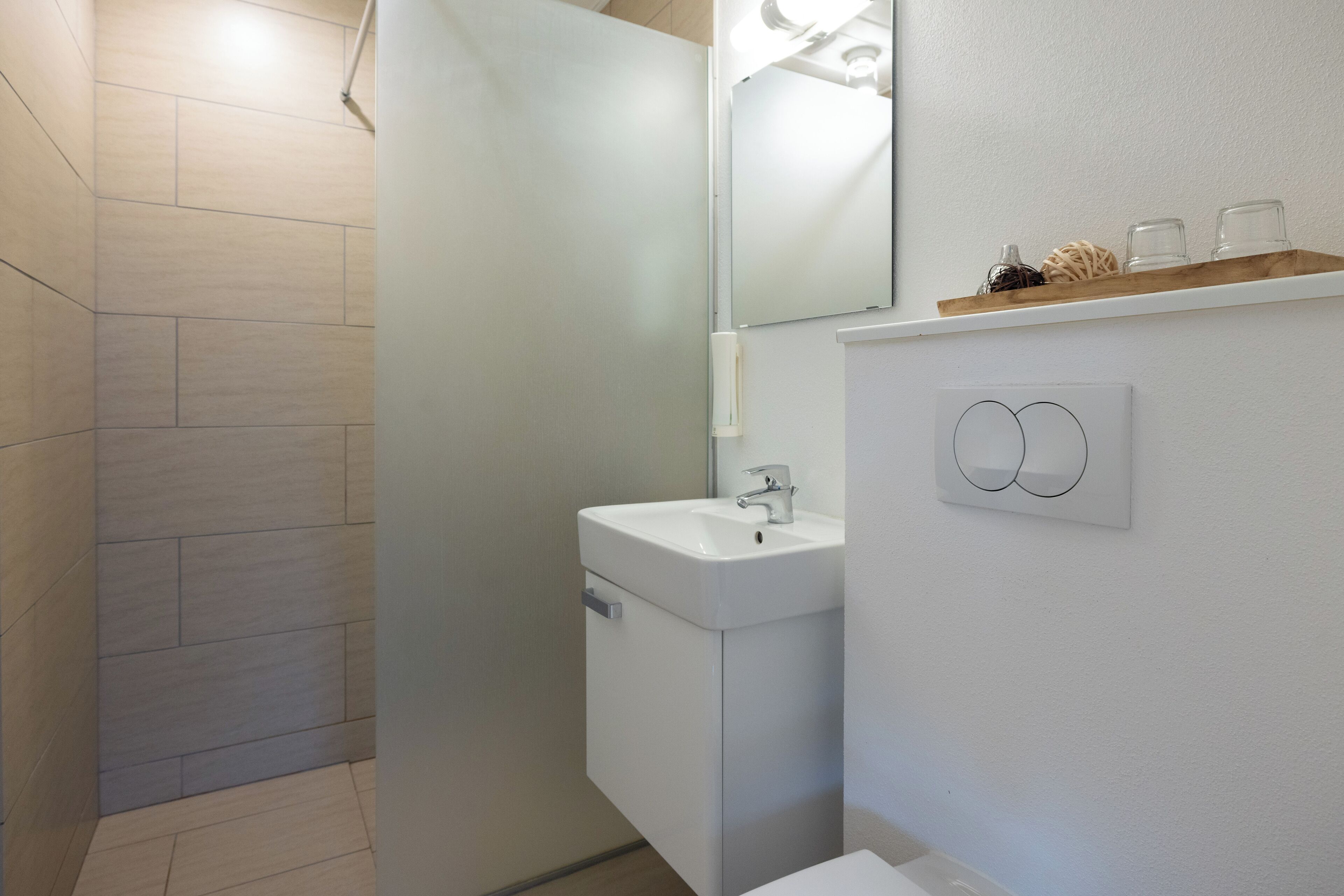 superior room | bathroom | shower, hair dryer, towels, soap