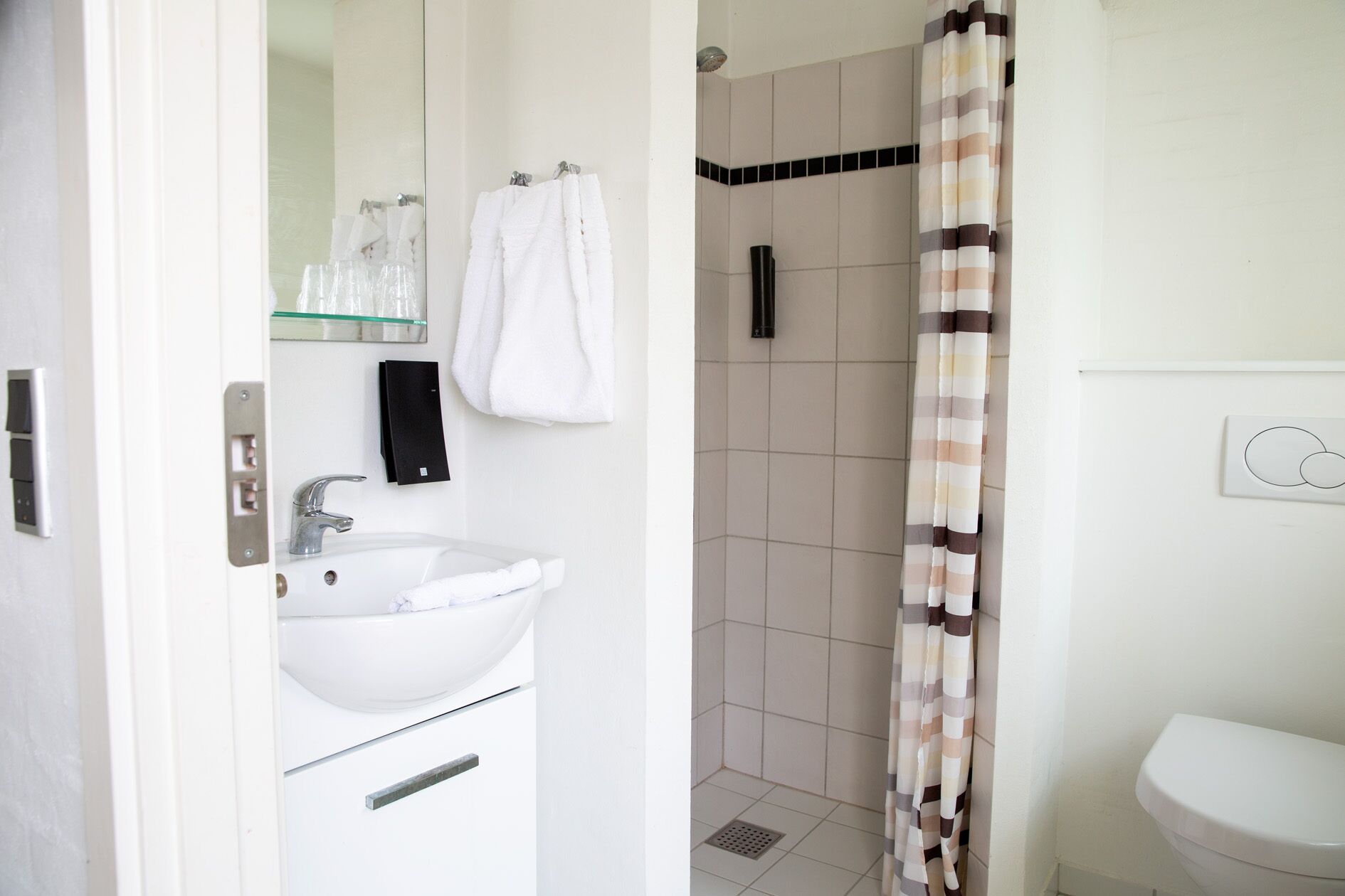 shower, free toiletries, hair dryer, towels