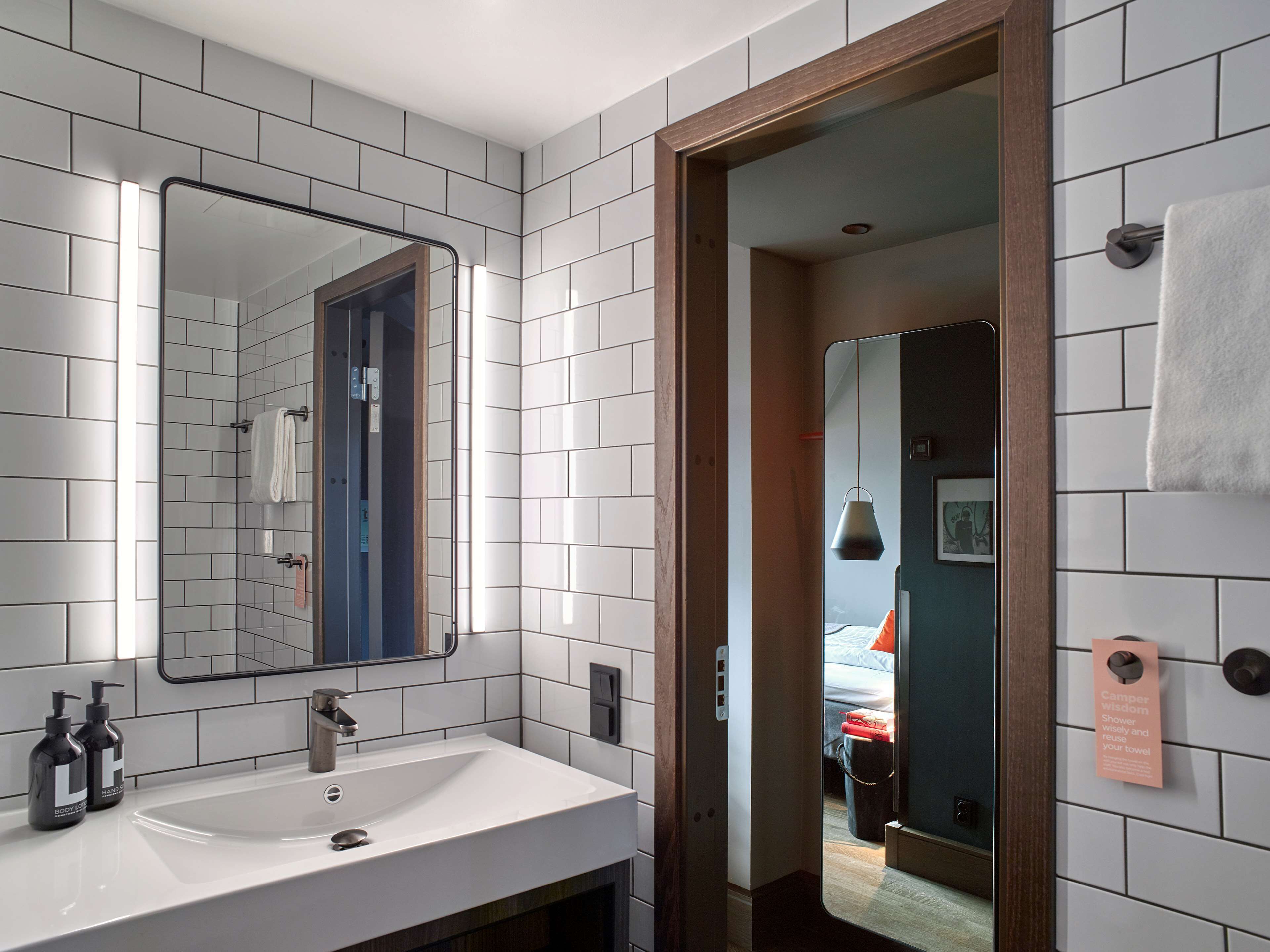 eco-friendly toiletries, hair dryer, towels