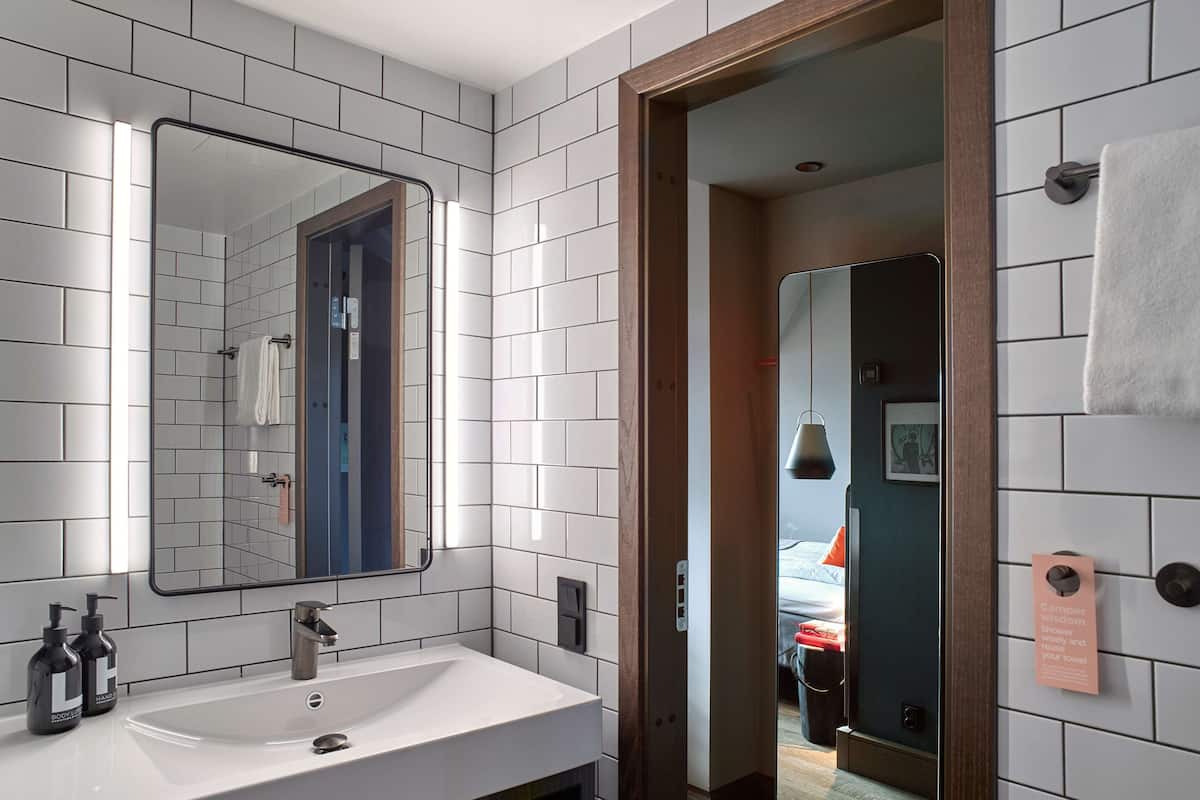 eco-friendly toiletries, hair dryer, towels