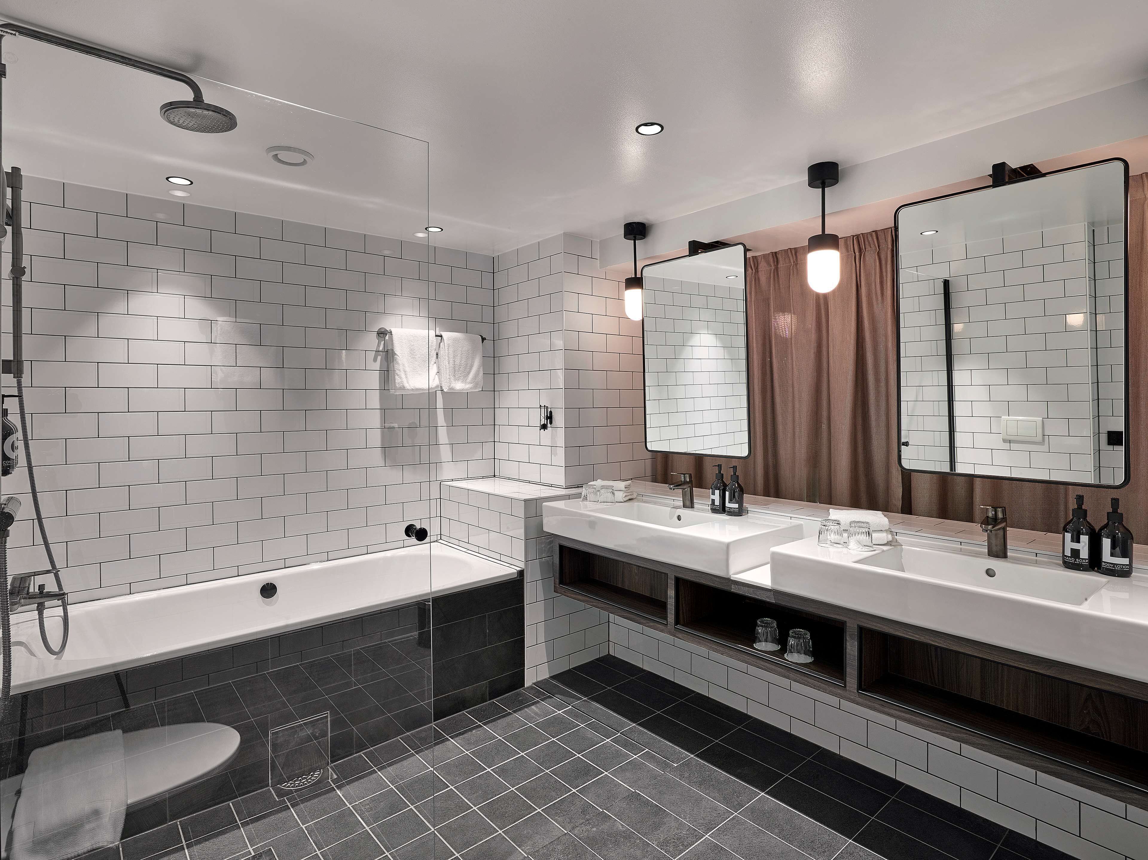 eco-friendly toiletries, hair dryer, towels