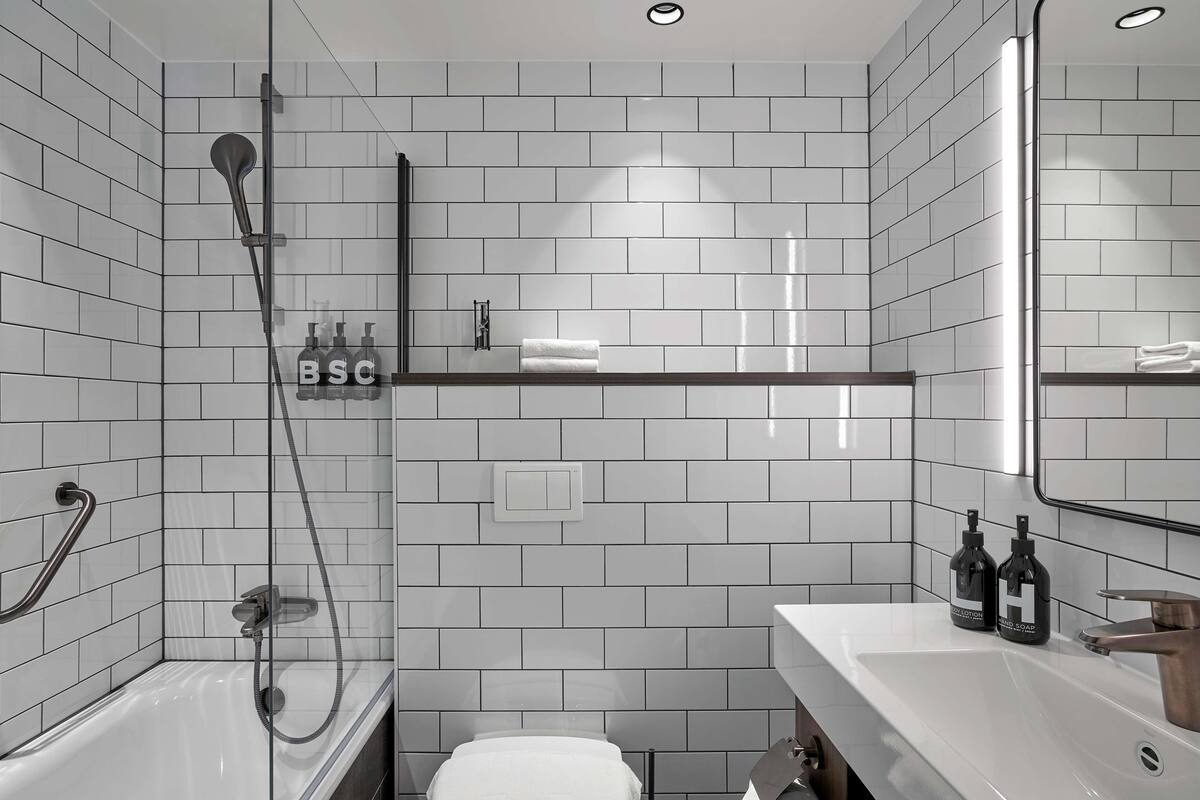 eco-friendly toiletries, hair dryer, towels