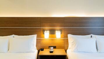 Pillow-top beds, in-room safe, desk, laptop workspace