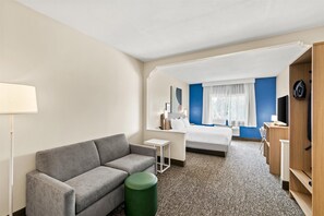 Room, 1 King Bed with Sofa bed | Living area | 50-inch TV with satellite channels, pay movies - Spark by Hilton Round Rock (Round Rock)