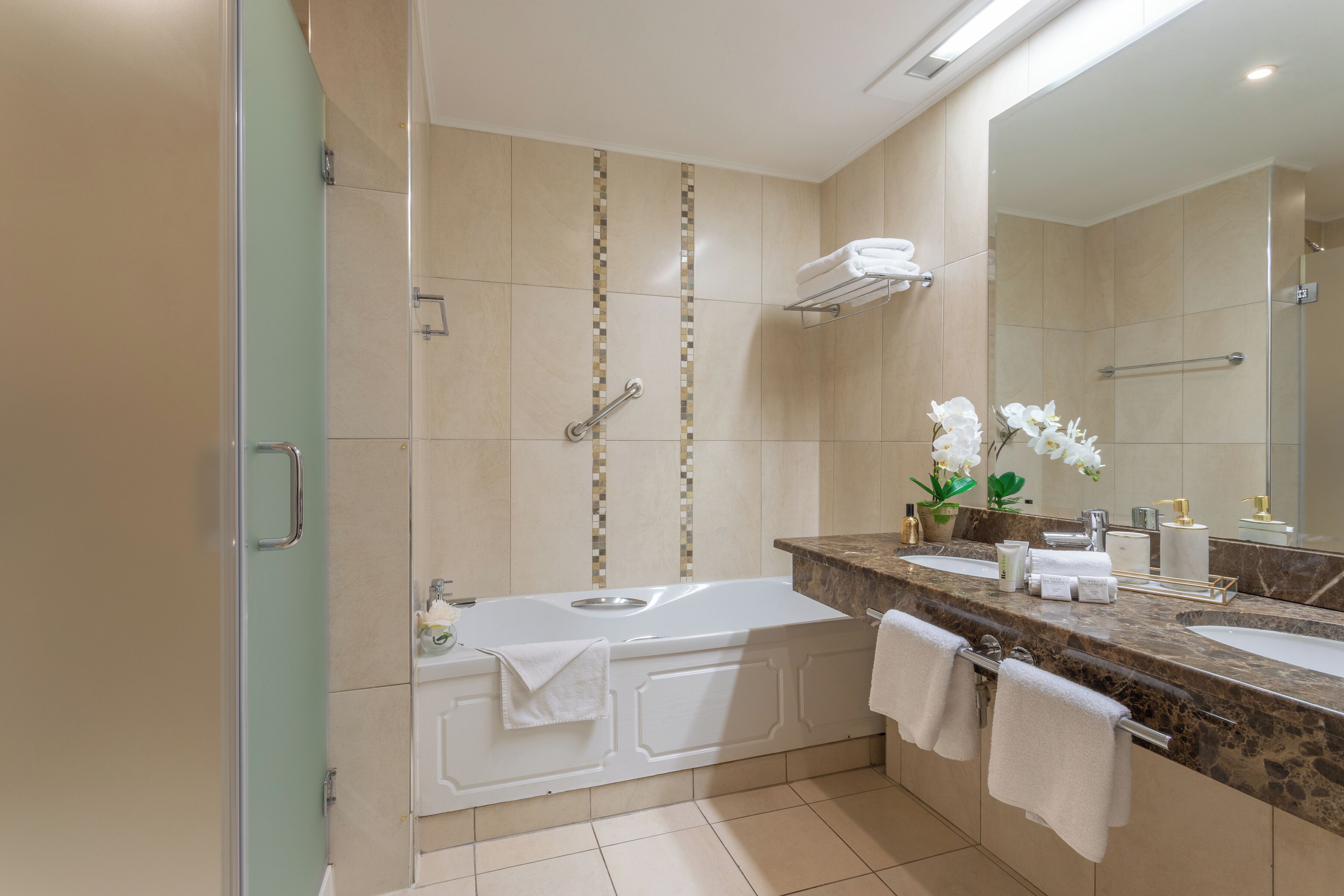 superior double room | bathroom | hair dryer, towels, soap, shampoo
