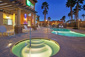 A hotel pool area with lounge chairs and a hot tub. - Holiday Inn Express & Suites Rancho Mirage - Palm Spgs Area by IHG (Rancho Mirage)