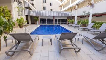 Outdoor pool, open 8:00 AM to 8:00 PM, pool umbrellas, sun loungers