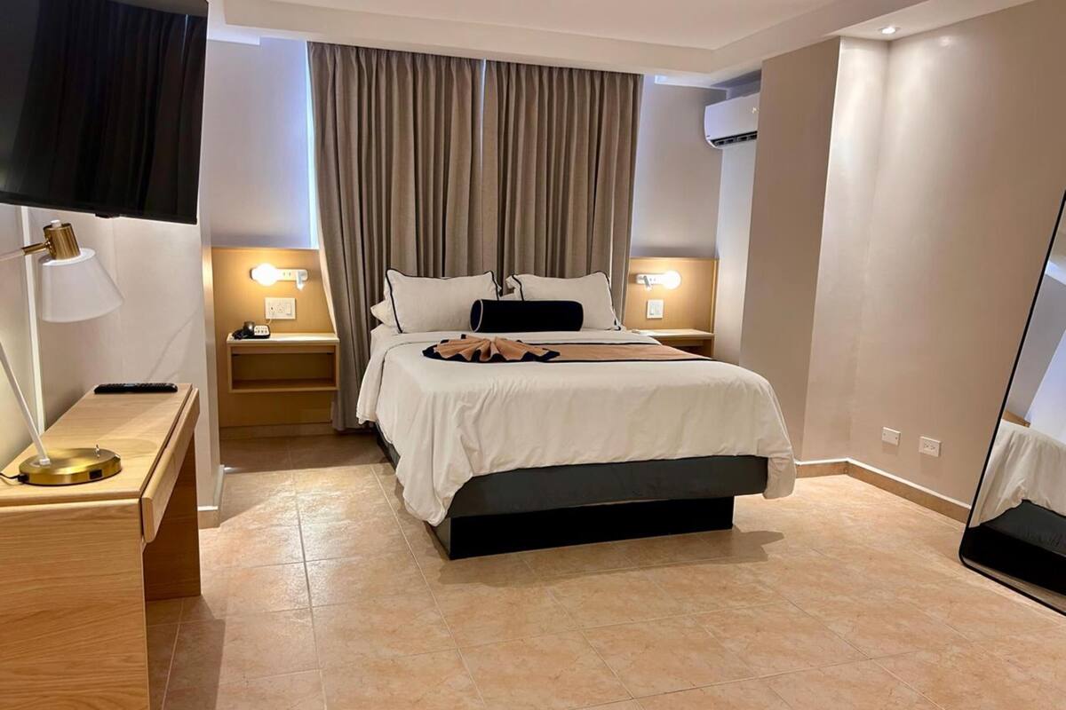 Premium bedding, down duvets, Select Comfort beds, in-room safe
