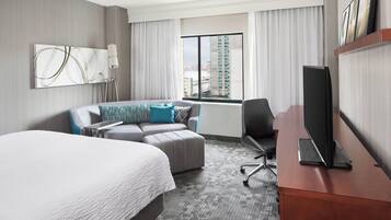 Desk, laptop workspace, blackout drapes, iron/ironing board