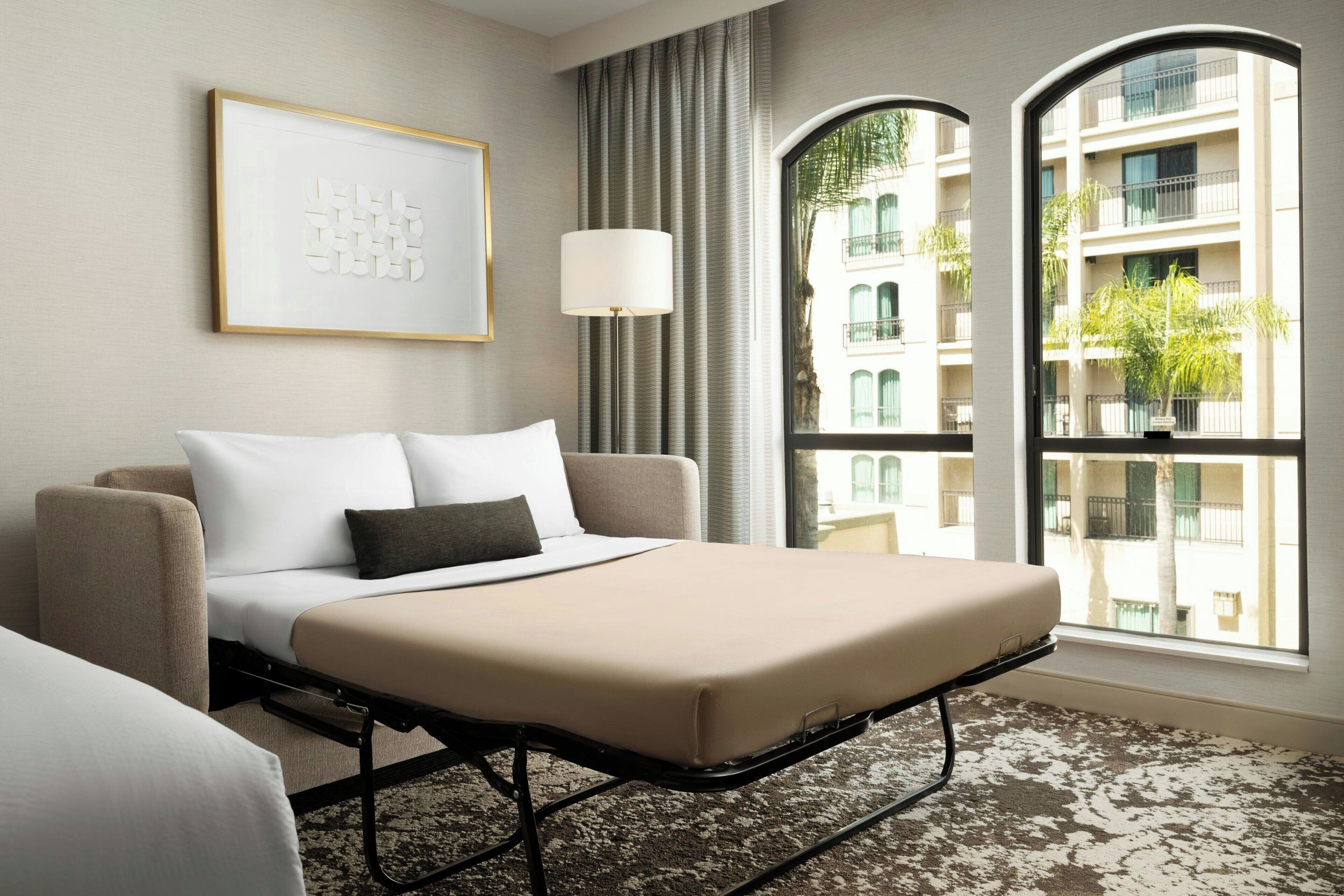 deluxe room, 1 king bed with sofa bed, non smoking, pool view | pool | outdoor pool, pool umbrellas, pool loungers