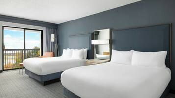 Premium bedding, down comforters, desk, laptop workspace