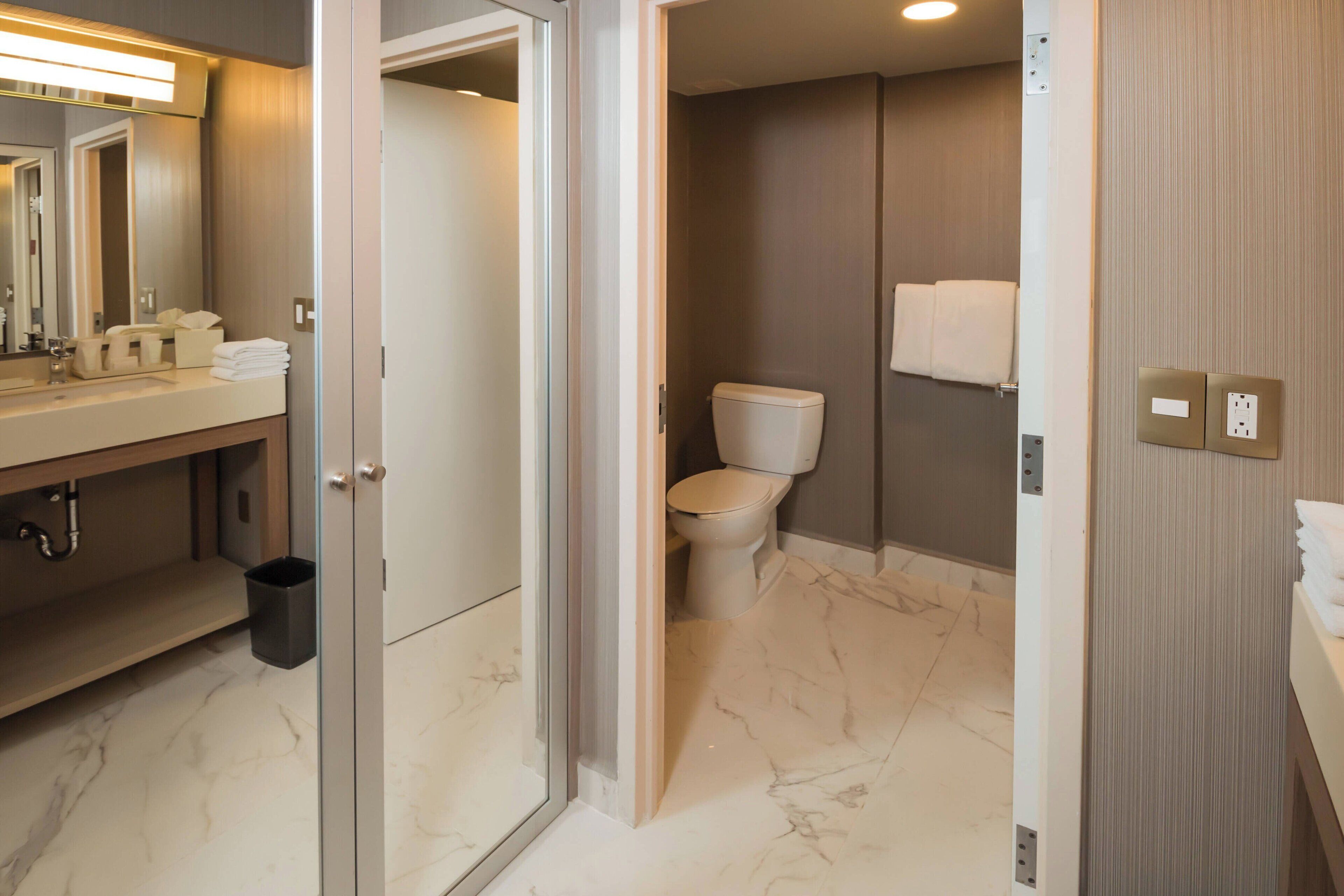 room, 2 queen beds | bathroom | hair dryer, towels