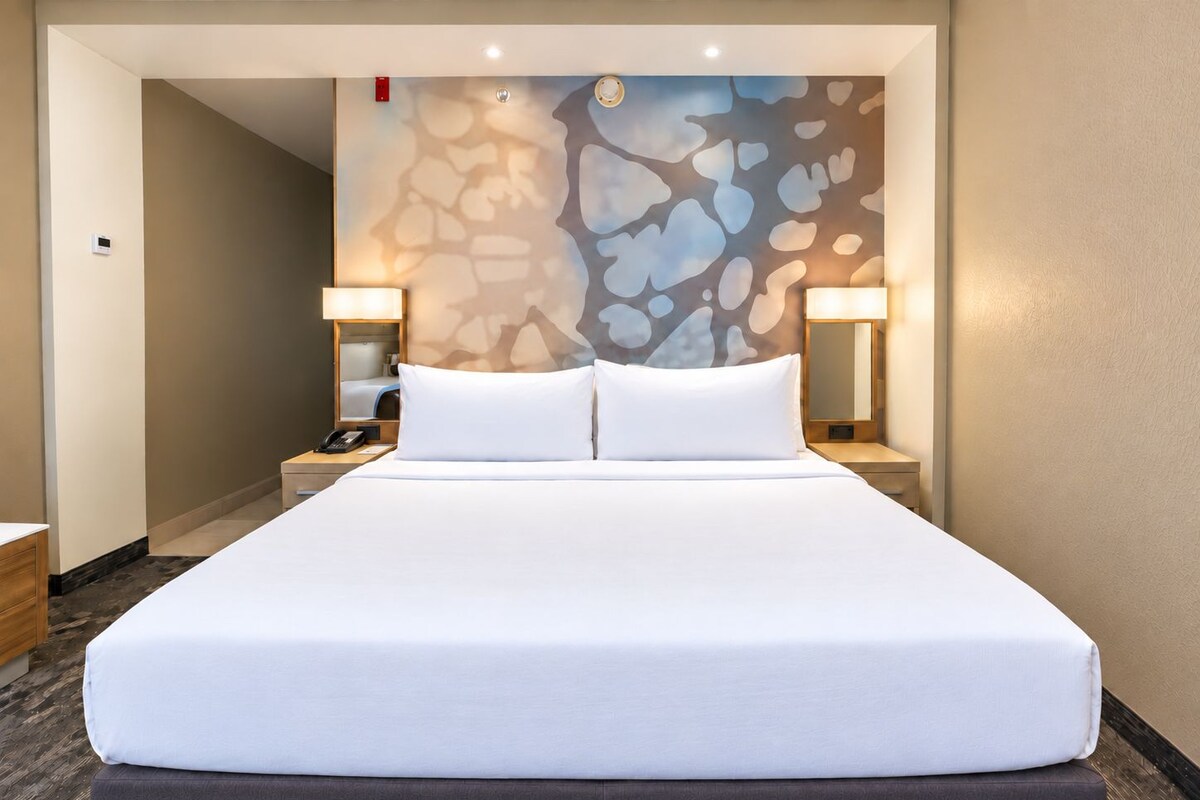 Room, 1 King Bed with Sofa bed | In-room safe, desk, blackout drapes, iron/ironing board