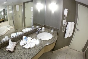 Bathtub, hair dryer, towels