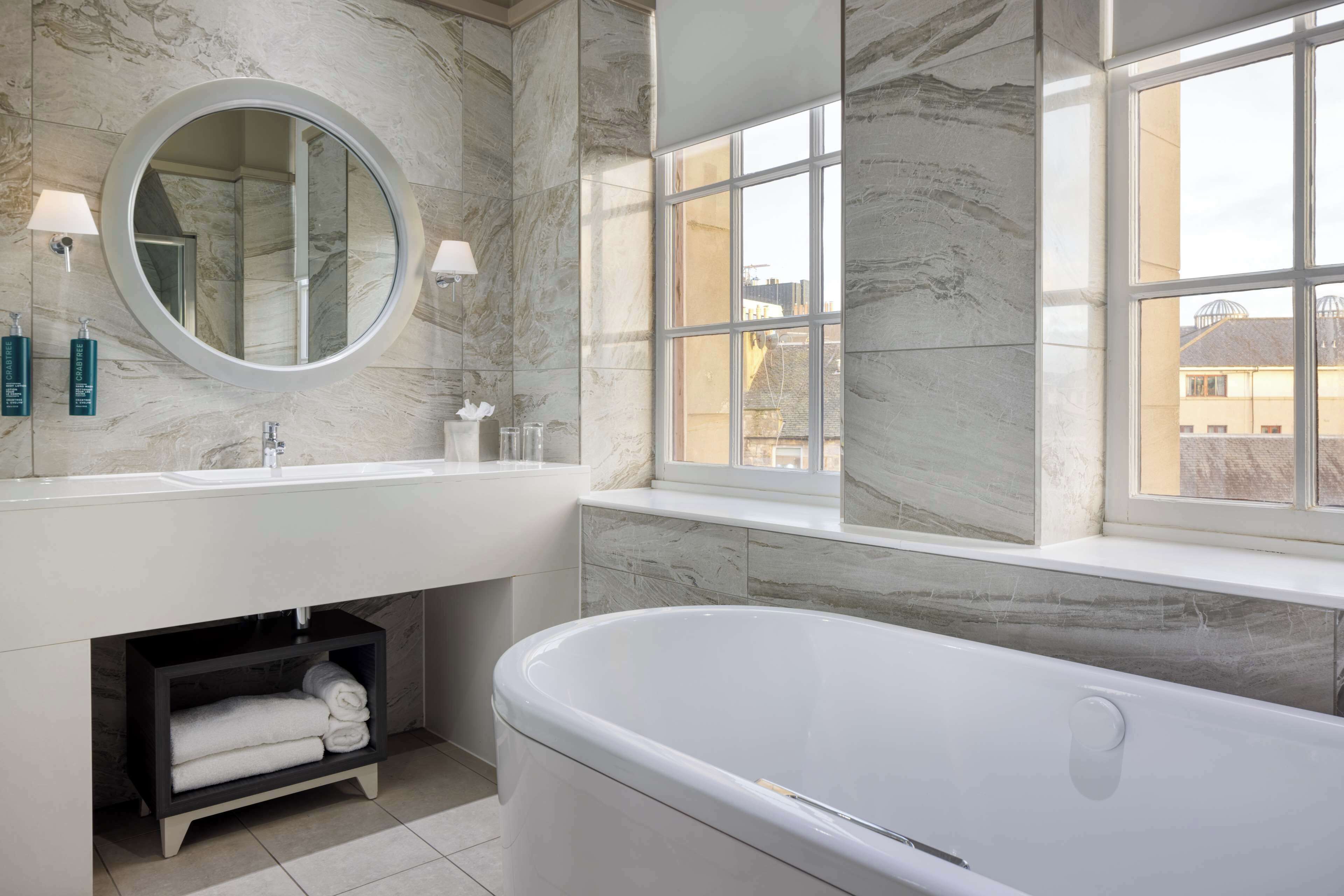 suite, 1 bedroom (castle view) | bathroom | combined shower/bathtub, free toiletries, hair dryer, towels