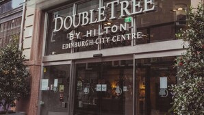 The DoubleTree by Hilton Edinburgh City Centre building facade with large windows and a prominent sign. - DoubleTree by Hilton Edinburgh City Centre (Edinburgh)