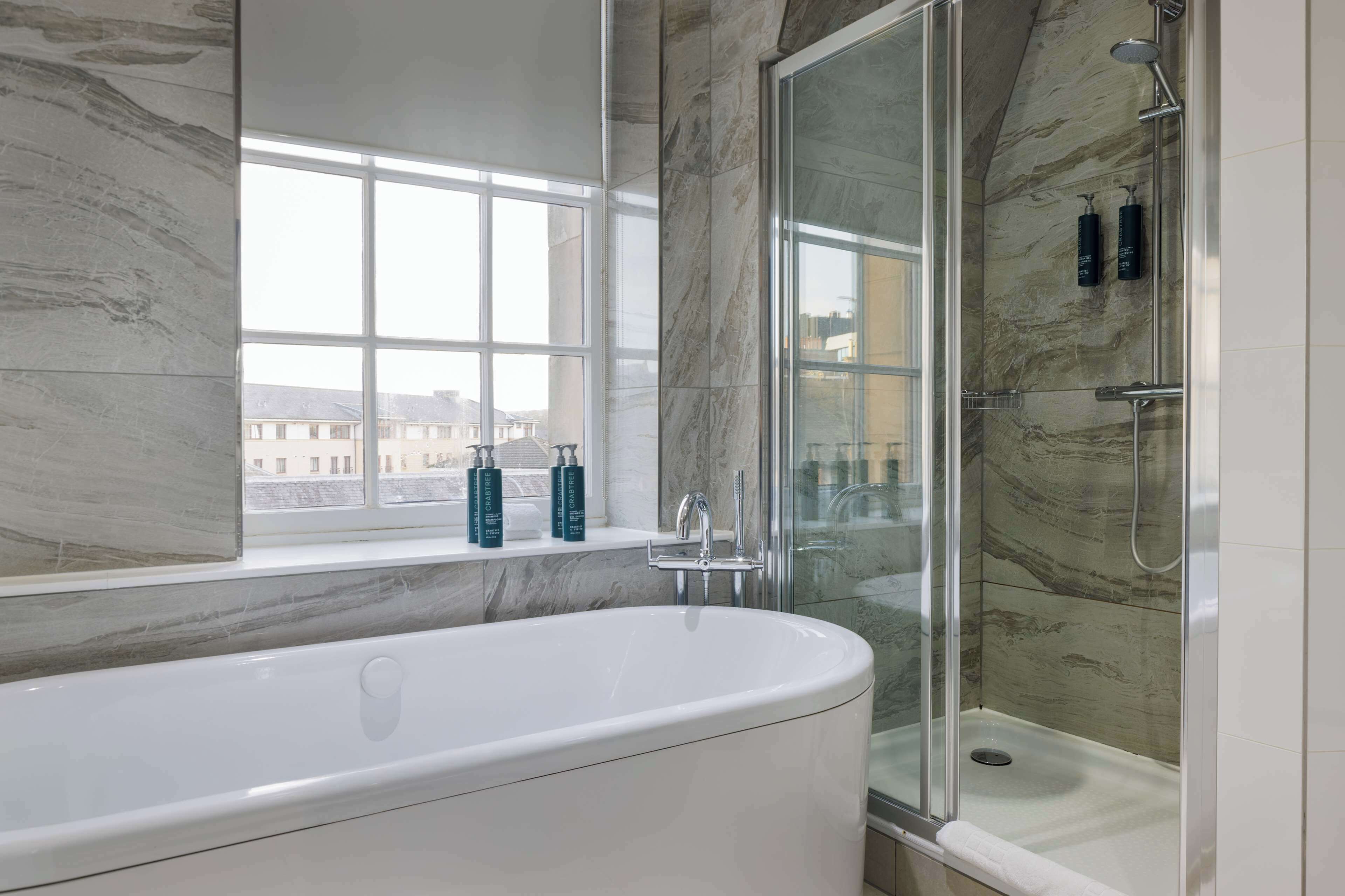 suite, 1 bedroom (castle view) | bathroom | combined shower/bathtub, free toiletries, hair dryer, towels