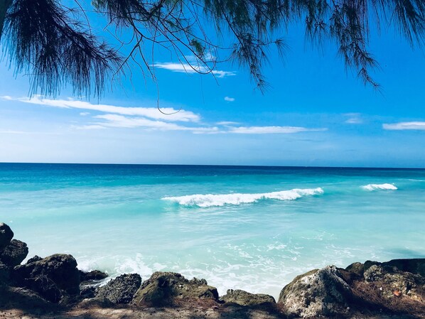 Beach nearby, white sand, sun loungers, beach umbrellas