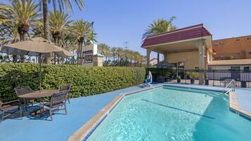 Outdoor pool, open 9:00 AM to 9:00 PM, sun loungers