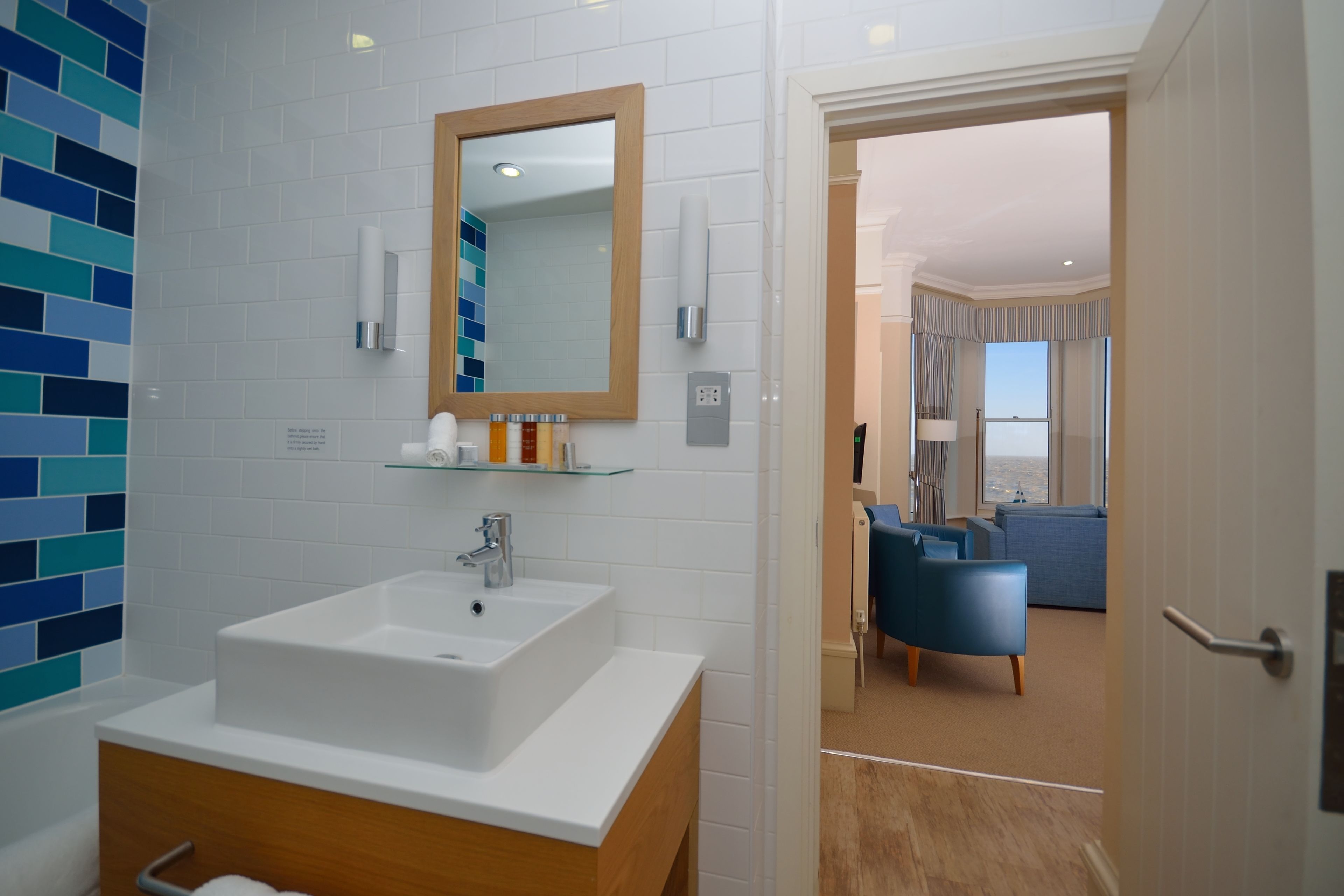 combined shower/bathtub, free toiletries, hair dryer, towels