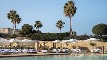 Indoor pool, outdoor pool, open 7:00 AM to 8:00 PM, free cabanas