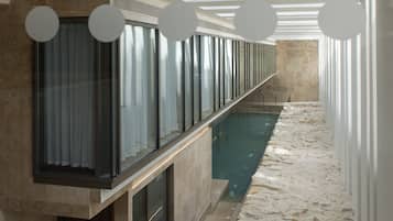Un sauna, baño turco, masajes con piedras calientes